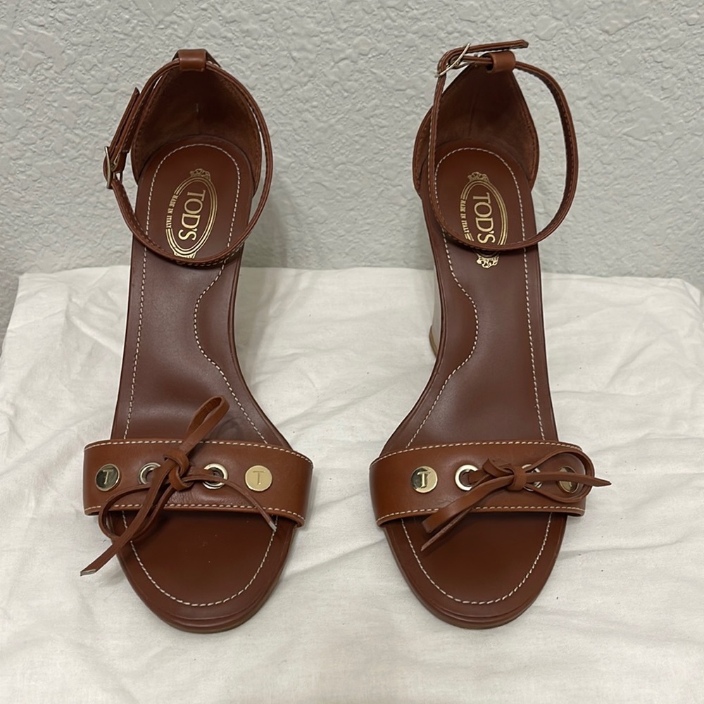 Tod’s wedge sandals. Size 6.5 . Brown leather